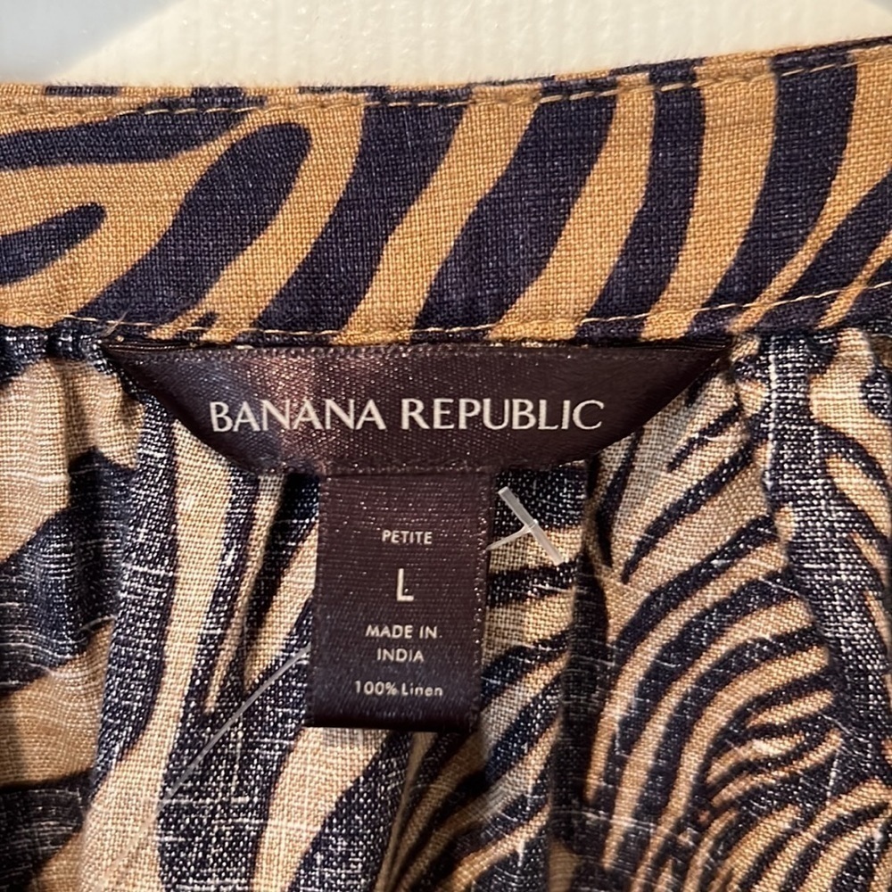 Banana Republic Boho Style Tunic Top Large Petite
Navy Blue Tan Zebra Animal - Picture 2 of 11